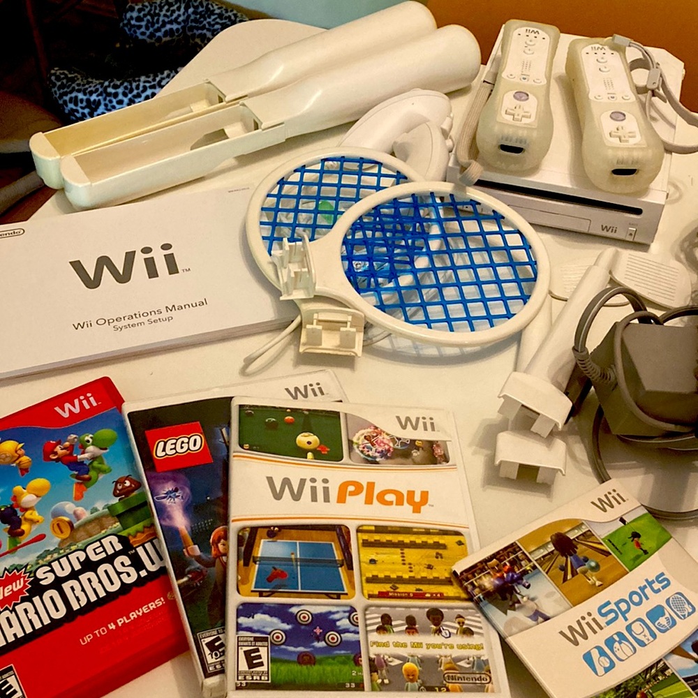 Wii Console with 2 Controllers, 4 Games, & Wii Sports Attachments